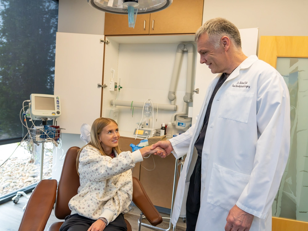 Doctor shaking hands with patient at Colorado Oral Surgery